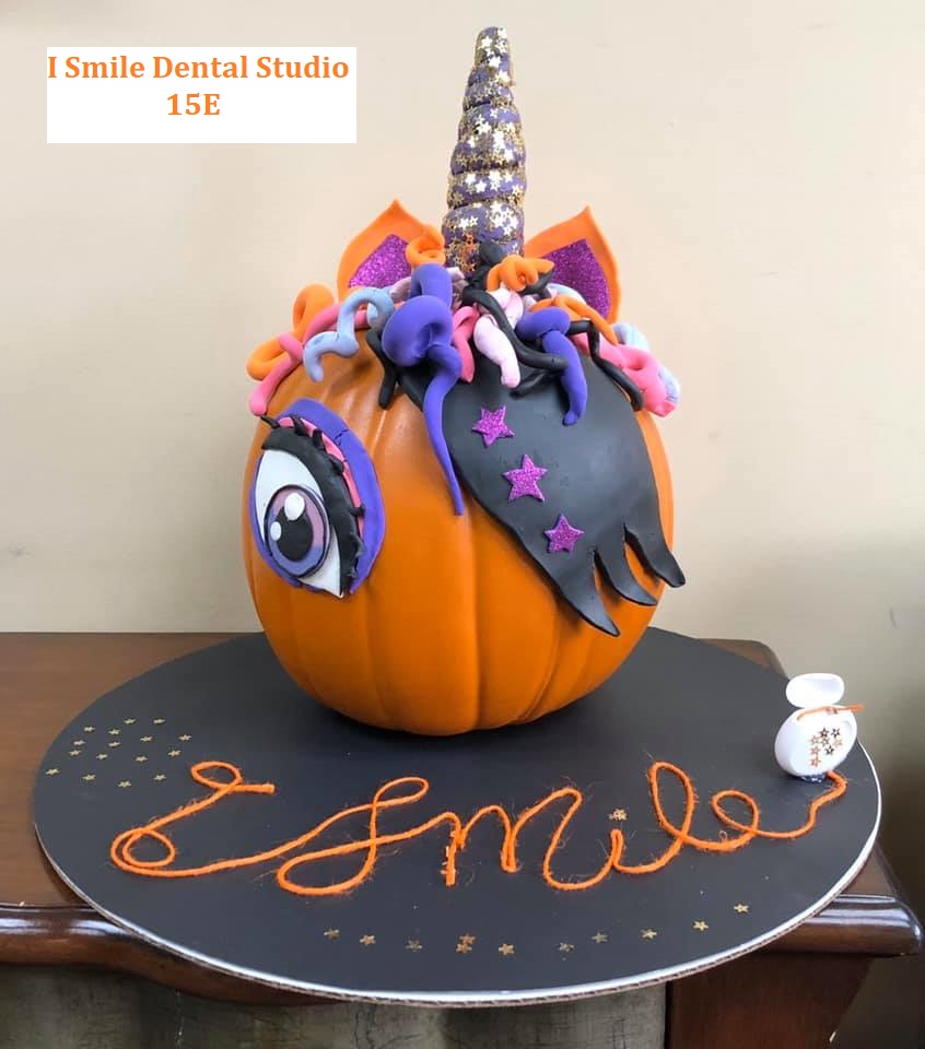 Pumpkin decorated to look like a unicorn